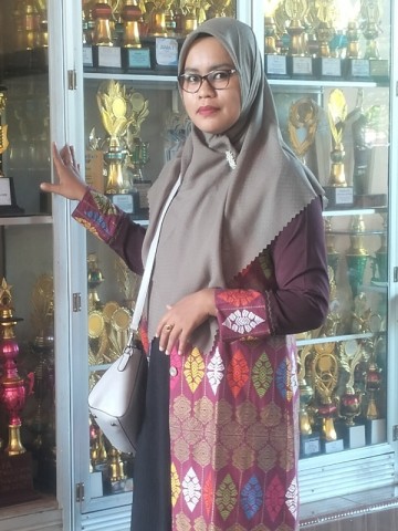 Rini Andriani,S.Pd